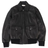 亞歷山大麥昆 (Alexander McQueen) 603442 雙面拉鍊羊皮夾克，黑色和深灰色拼接，尺寸 46，成色極佳。夾克飾有品牌標誌壓花。附有衣架和衣物隔層。正品，義大利製。