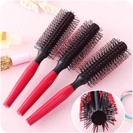 1 Round hair styling comb (Central Inland)