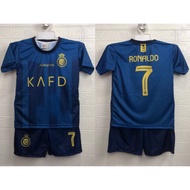 Jersey Al Nassr Shurfah Ronaldo Anak Setelan Printing KAFD 7 Kuning Biru