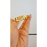 LV EMPREINTE bangle in Gold Stainless Steel