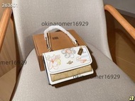 coach蔻馳新品花卉刺繡翻蓋鏈條風琴包