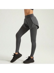 1條女士假兩件式彈性長運動褲,配雙側口袋,適用於跑步健身