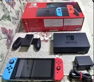 Switch 主機台灣公司貨-電力加強版＋一對正版joy-con+四片遊戲片及週邊配件