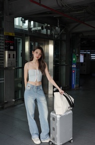 ams.commune กางเกงยีนส์ทรงกระบอกสีอ่อน