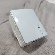 This is a TP-Link TL-PA4010 AV600 Powerline Adapter