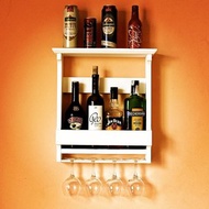 Rustic whisky bottles rack with glass holder. Wooden bottles shelf mini bar.