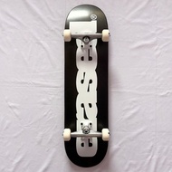 Erased “Classic Black” 8.25” x 31.5” Custom Skateboard Complete