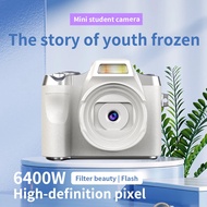 ToKerNew 64MP Mini Camera with Screen HD 1080p Portable Video Recorder with Flash Light Battery Dock