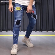 Navy patch ripped jeans
