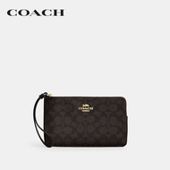 COACH กระเป๋าคล้องมือผู้หญิงรุ่น Large Corner Zip Wristlet In Signature Canvas CZ277 IMXAQ สีน้ำตาล