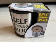 Self stirring mug