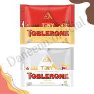 Toblerone Tiny chocolate with honey & almond nougat Weight 200 Grams Has 2 Flavors.