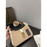 CK underarm/crossbody bag at the shop is super beautiful