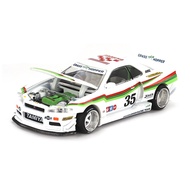 Nissan Skyline GT-R (R34) TAMIYA x KAIDO HOUSE The GRASSHOPPER V1 1:64 (MINI GT)