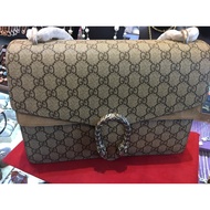 Dionysus GG Supreme Medium coated canvas and suede shoulder bag