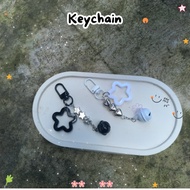 KEYCHAIN STAR BLACK AND WHITE BELL COUPLE KEYCHAIN Nan.mlg GC001