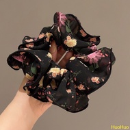 Floral chiffon hair bands go well with hair bun accessories