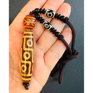 9-eye dzi necklace with good energy source