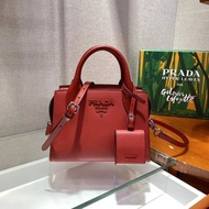 New Female Bag 1BA269 This Double Handle Saffiano Leather Handbag Design Is Perfectly Matched with C