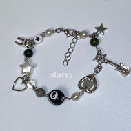 downtown grunge aesthetic dark green cute star themed charm bracelet