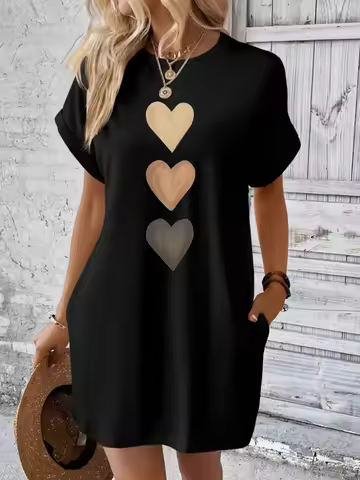 Black summer dress with cute heart prints. Ideal for evening outings. Shop now!