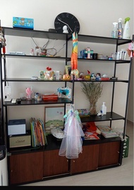 Indigo shelves with storage at the bottom