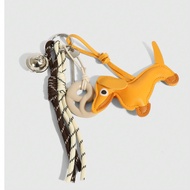 1. Baddie Style Keychains: - Cute Puppy Keychain - Car Key Chain - -Style Pretzel Keychain - Abacus 