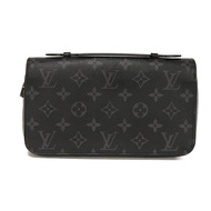 Pre-owned LOUIS VUITTON Zippy XL (older model), LV logo, flower design, black, round zipper, handle 