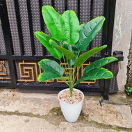 Artificial banana tree includes pot