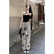 Chrome Hearts Smoke Jeans with Embossed Pattern