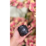 Canon 50mm fixed lens, not Canon 85mm lens, not Canon 35mm lens