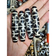 Dzi Dharma weapon, meaning of protection, peace, spiritual Tibetan feng shui