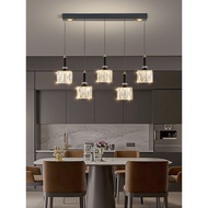 Crystal dining room lamp, modern, elegant, and luxurious2025New model of simple linear pendant light