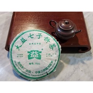 大益七子饼茶 ，普洱青饼茶[唛号:7542]