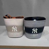 MLB洋基隊包包春季新款老花滿標復古撞色百搭水桶包單肩斜挎包