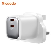 อะแดปเตอร์ชาร์จ MCDODO 140W GaN แบบสามขา หัวปลั๊กแบบอังกฤษ ช่องเสียบ Type-C คู่ ชาร์จเร็วสำหรับโน้ตบ