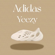 Adidas originals เป็นแฟชั่น รองเท้าแตะ รองเท้าหญิง พื้นรองเท้านิ่ม Yeezy Froam Runner “Onyx EVA” รองเท้าผู้ชาย สะดวกสบาย น้ำหนักเบา