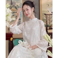 Ao dai, both set with embroidered flowers and colorful pants. Ao dai, odd pants, beautiful multi-col