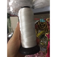 Thread even though the beads and loops