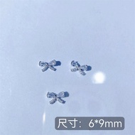 Set of 2 nail charms with bow nails A12