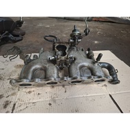 Intake manifold carburetor mount mazda 323 interplay 89-97