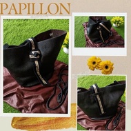 tas papillon bekas