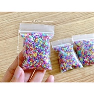 Small Garden Decoration Colored Stones Packed In A 4x6 cm Bag.