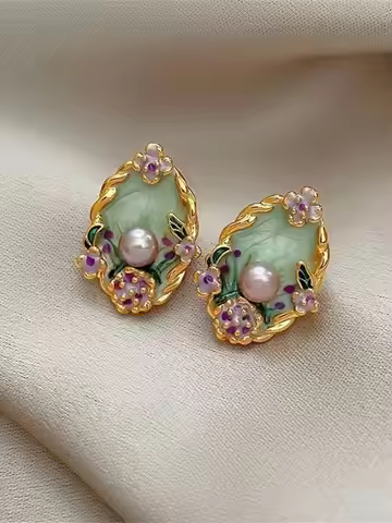 These are unique and elegant Monet Garden-inspired retro oil painting style stud earrings. They exud