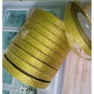 Per roll 25 yards of 22.5 meters/, 1 cm wide gold glitter organza