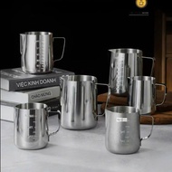 Milk frother with handle, milk frother, milk frother