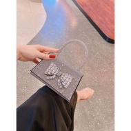 Túi cầm tay đi tiệc Bling đính nơ sang trọng và nổi bật. Phù hợp làm túi đi tiệc tùng SHE HOUSE