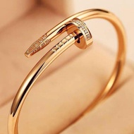 JH FASHION NAIL BANGLE STAINLESS STEEL GOLD PLATED (UNISEX)