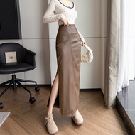 Yimei váy một nửa camera da PU màu nâu cho nữ 2024 phong cách mới ôm eo cao ôm hông chân váy dài với