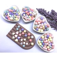 (1 pound) pastel glowing/ beads